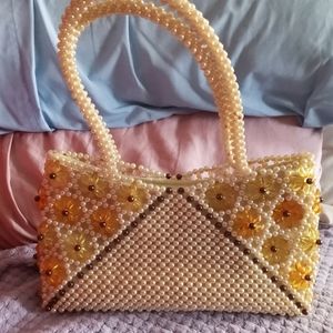 Pearl embellished purse collector wristlet